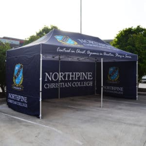 3m x 6m Gazebo marquee with roof print and a range of extras including walls and weights. Eye catching branding for outdoor events and provides shelter from all the elements for your staff, students and clients
